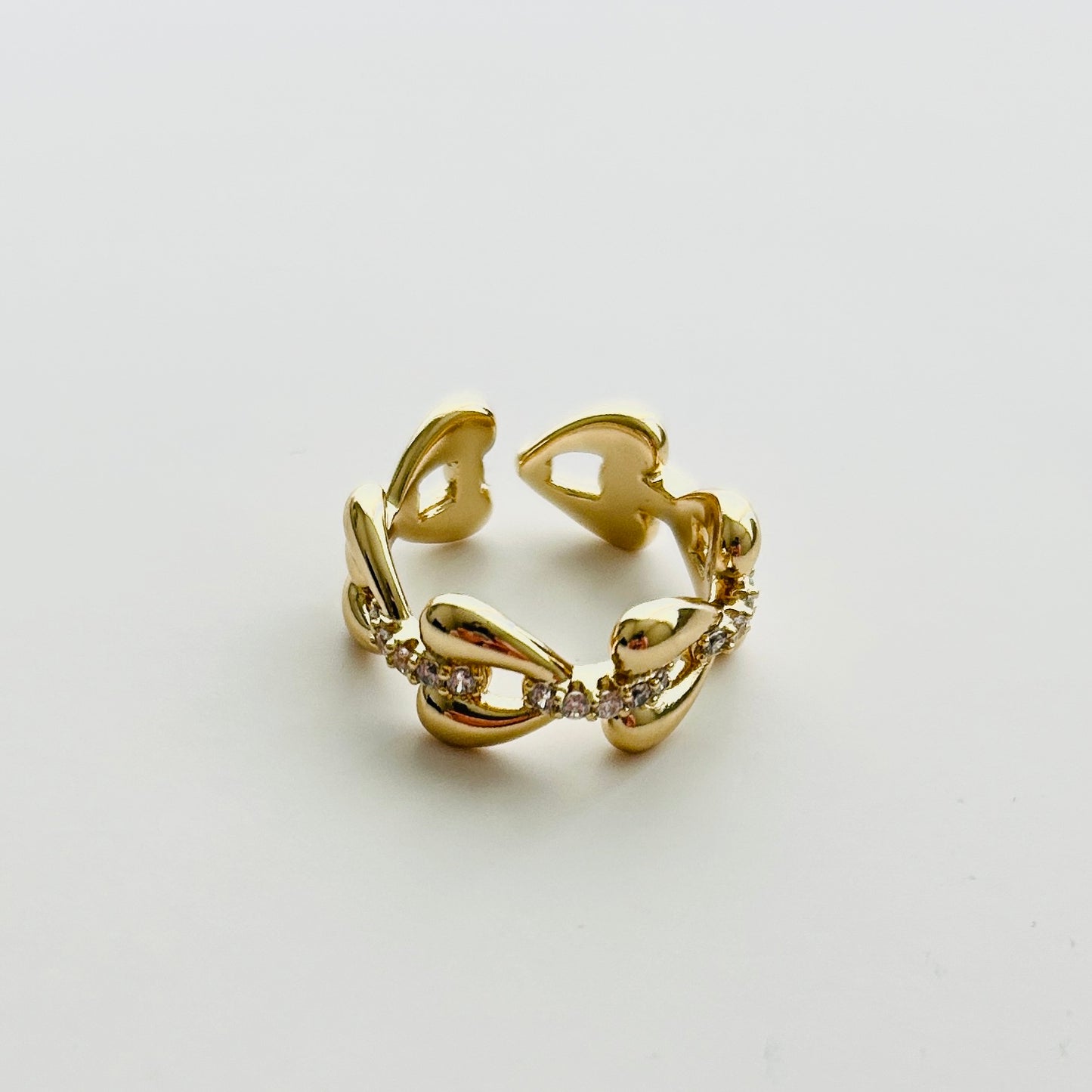 Luxury Adjustable Gold-Plated Ring with Heart Motifs and Sparkling Cubic Zirconia