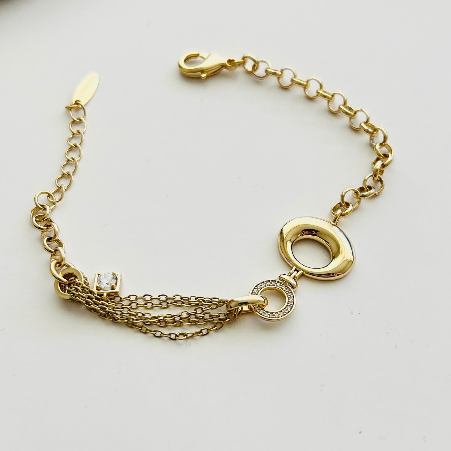 Gold Charm Bracelet with Elegant Details